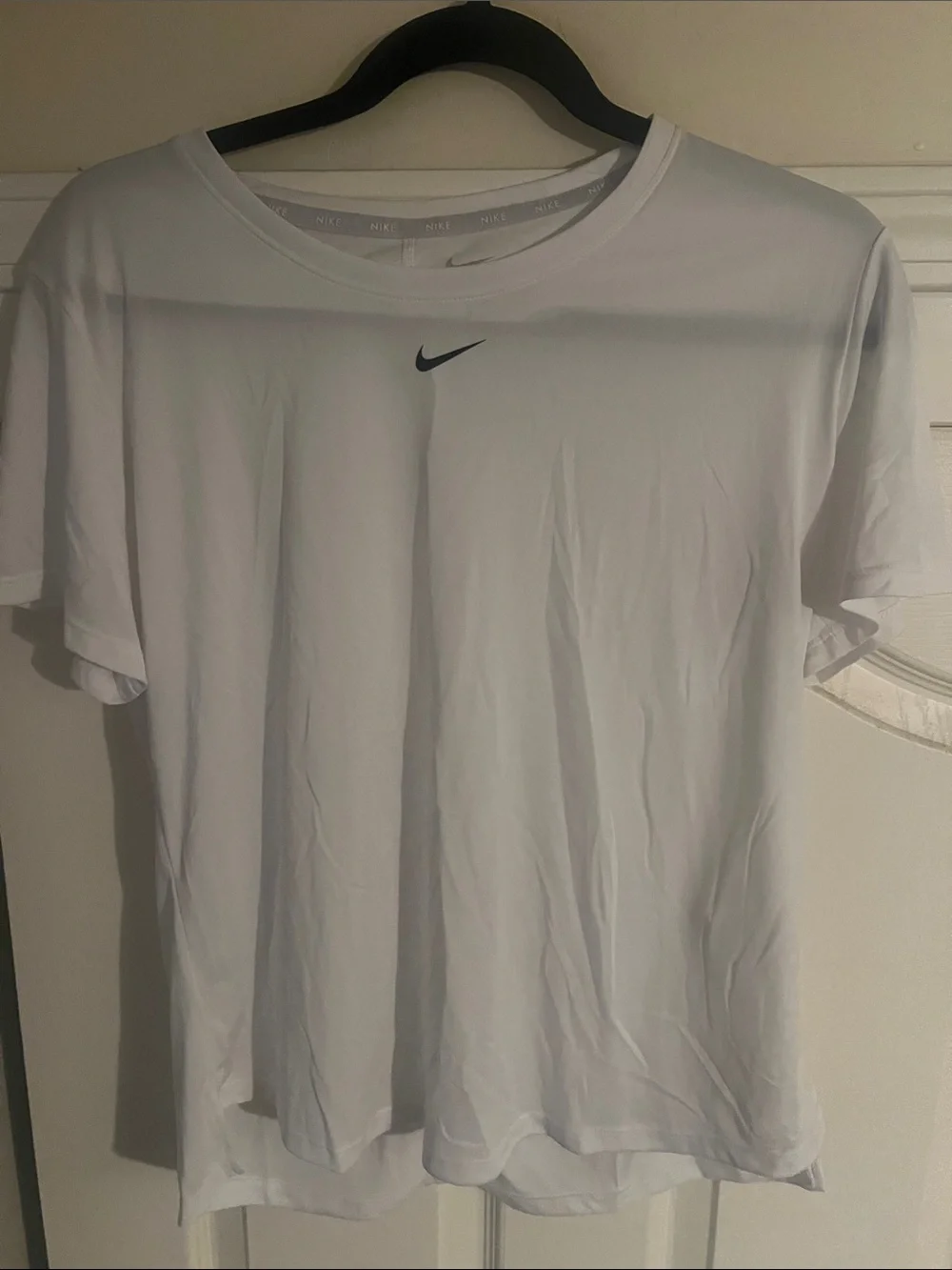 Nike White Short Sleeve T-Shirt with Black Swoosh